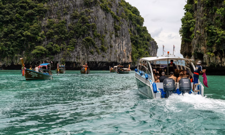 Turquoise bay with limestone cliffs and tropical islands in Phuket, Thailand