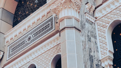 Makkah holy city architecture with the Grand Mosque exterior and surrounding Islamic heritage skyline, a significant ziyarat