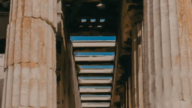 Ancient Athens ruins with Greek columns and sweeping views of the Acropolis landscape, highlighting historic architecture and