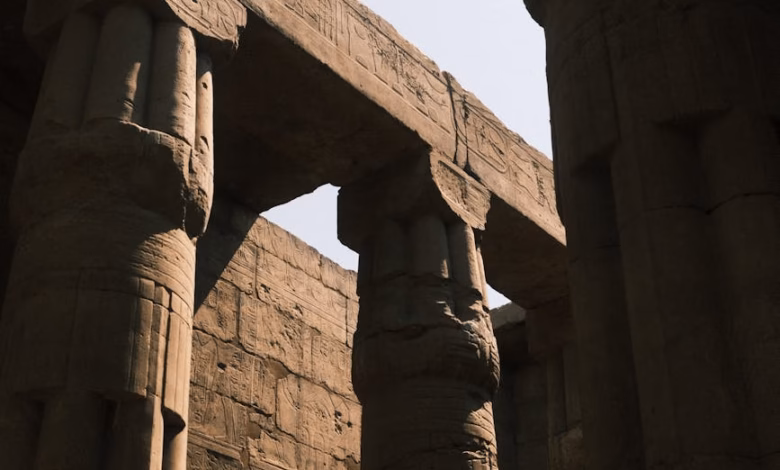 Luxor Egypt temples beside the Nile, with ancient ruins, archaeological columns, and a heritage landscape under a clear sky