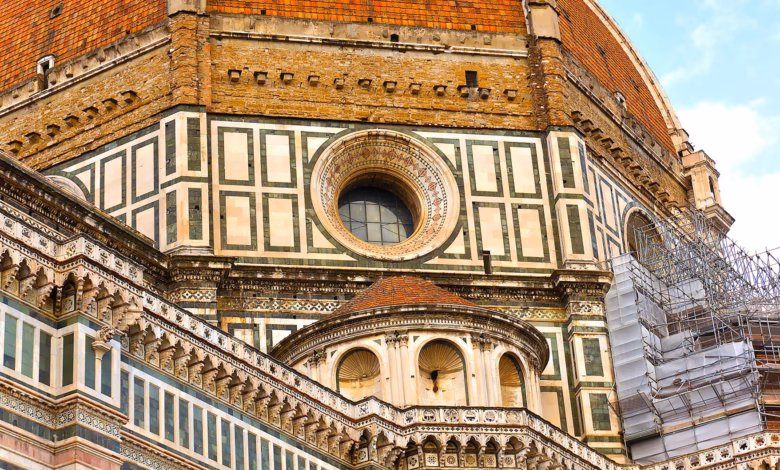 Florence skyline with the Cathedral dome, historic Renaissance rooftops, and warm terracotta architecture under a clear Tusca