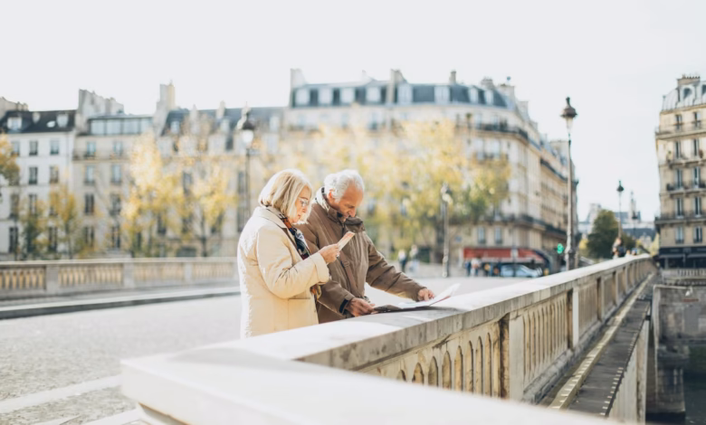 Accessible travel scene with a smooth waterfront promenade, gentle sea views, and a modern city skyline ideal for older trave