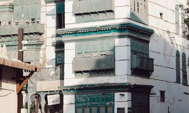 Historic coral-stone buildings and narrow old streets in Jeddah Al Balad, showcasing traditional Saudi heritage architecture