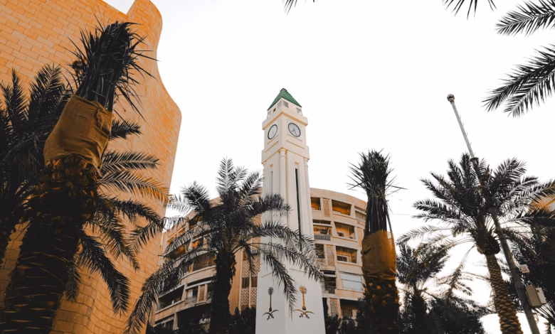 Riyadh luxury hotels and modern high-rise skyline at dusk in Saudi Arabia, showcasing sleek architecture and city lights agai