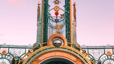 Colorful Orlando theme park entrance with vibrant attractions and palm-lined Florida family travel scenery