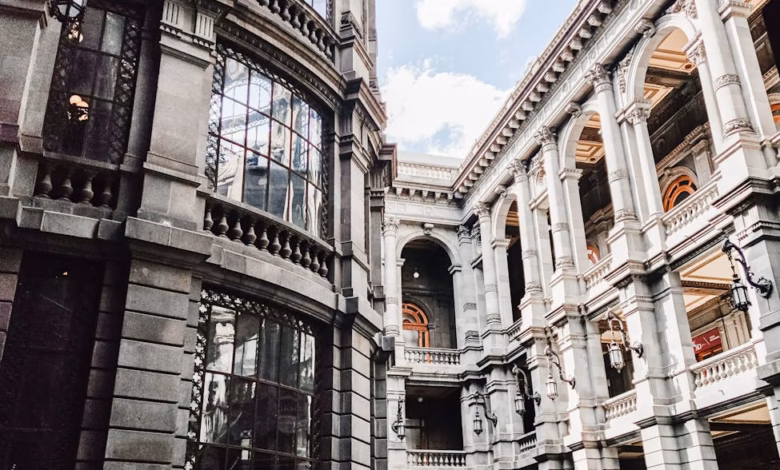 Historic Mexico City museum exterior with grand cultural travel architecture and a landmark façade surrounded by urban citysc